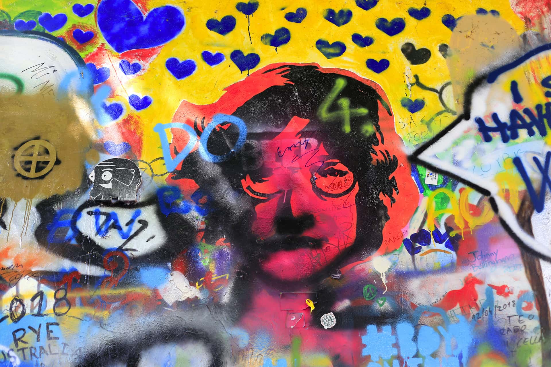 Get a chance to visit the amazing Lennon Wall in Europe tour packages from Delhi