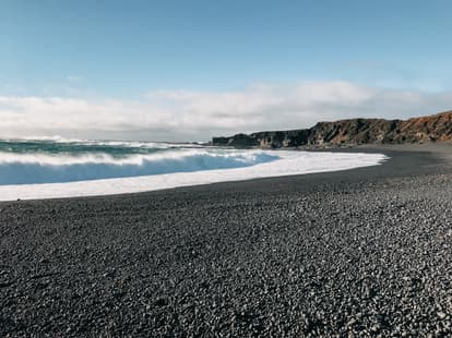 Enjoy the black sand beaches